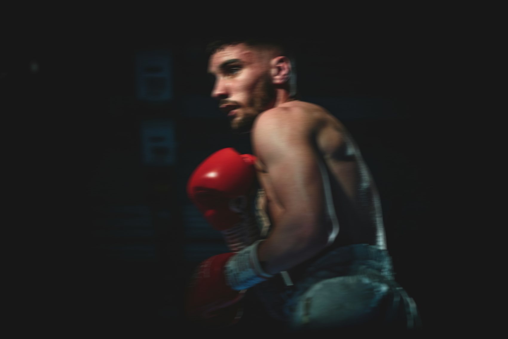 Adult boxer in the ring in partner-supplied AICO campaign photography