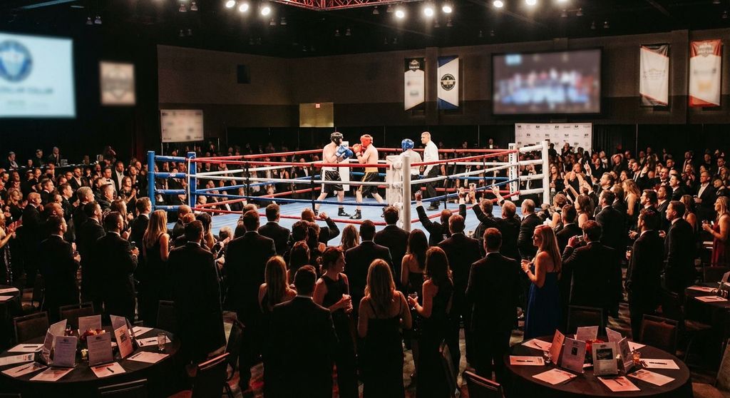 White collar boxing charity event - crowd, ring, fundraising atmosphere