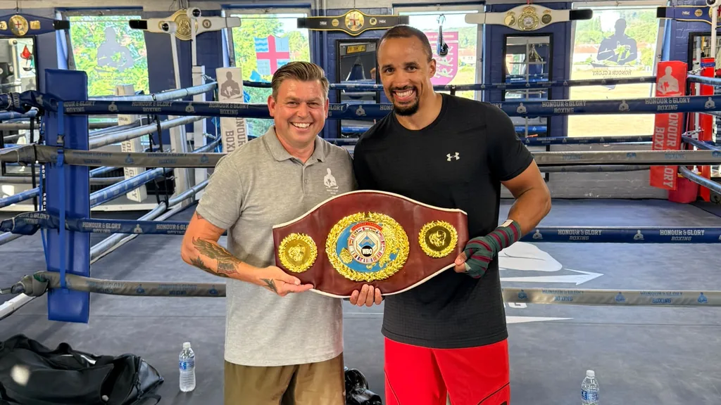 Anton Pattenden and Ellis Zorro holding the WBO European cruiserweight belt in the Honour and Glory ring