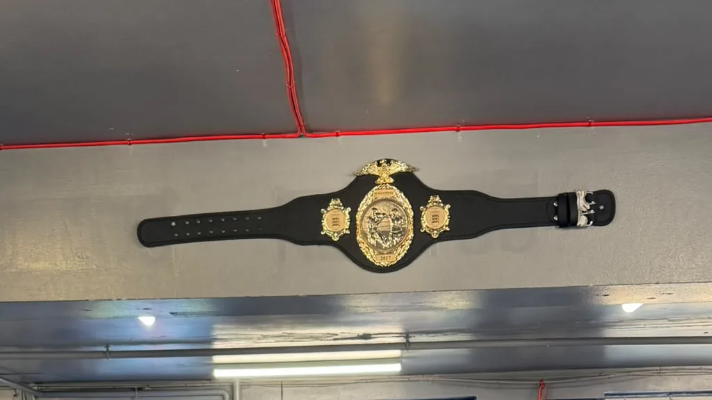 The WBO European cruiserweight belt displayed above the Honour and Glory boxing ring