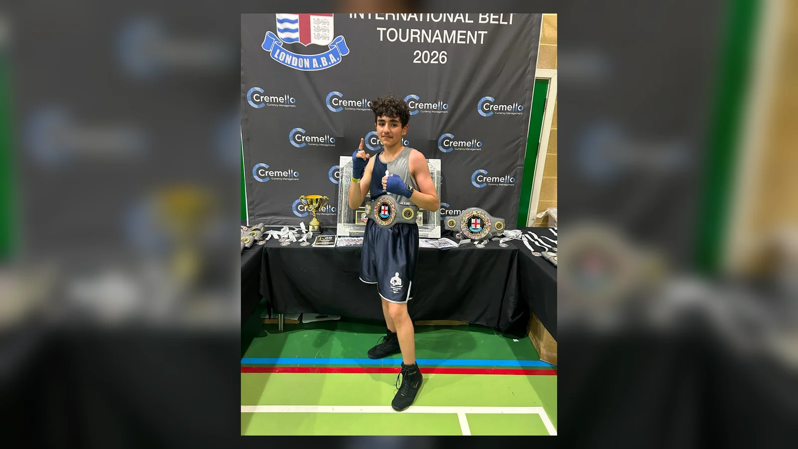 Junior Honour and Glory boxer wearing a London ABA International Belt Tournament belt
