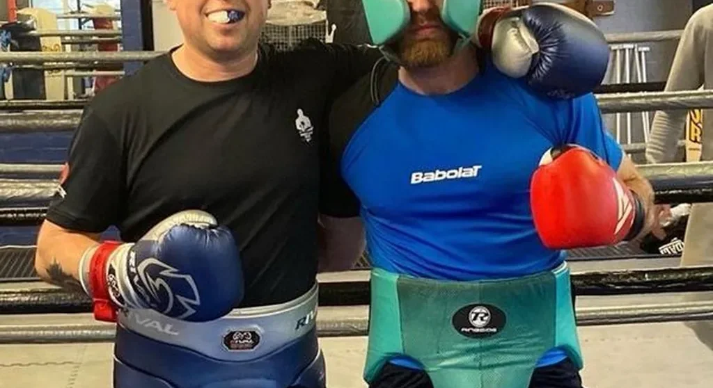 Boxers moving in stance during controlled partner drills