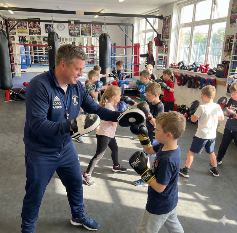 Anton coaching junior boxers