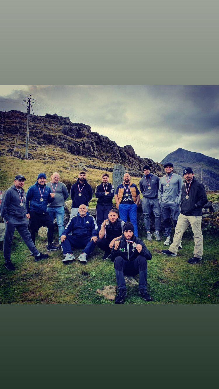 Team on mountain challenge