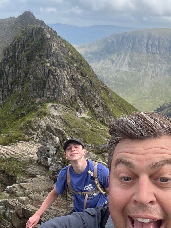 Members at a mountain summit