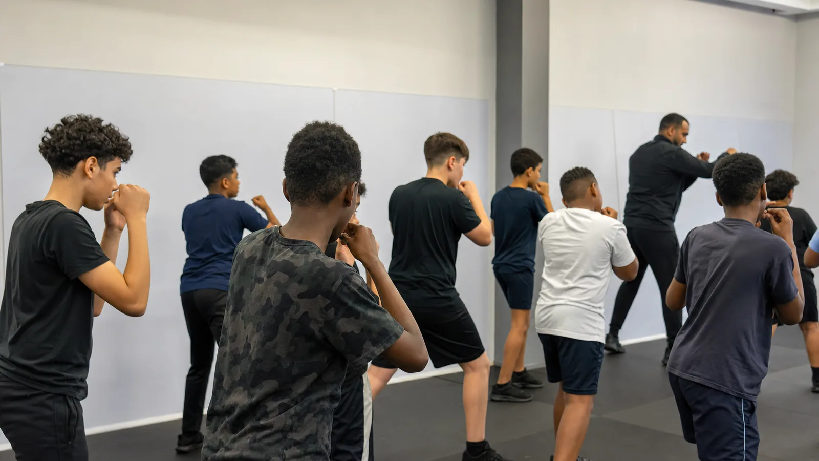 Young boxers receiving certificates at H&G