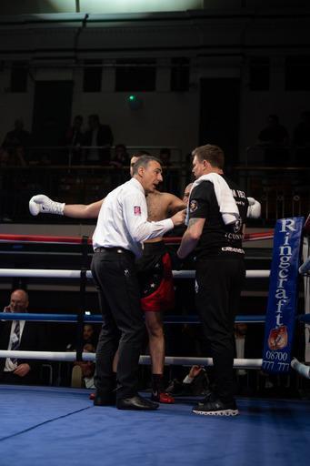 Team with fighter after professional bout at York Hall