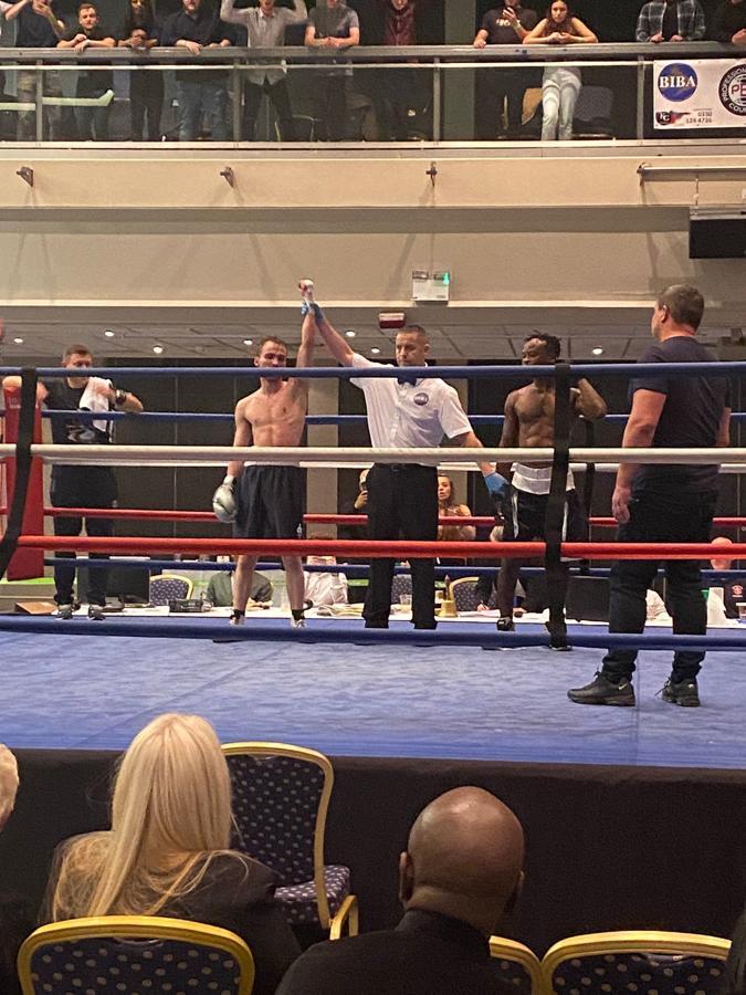 Head Coach Anton with professional fighter Ibz and the Honour & Glory team